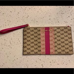 Michael Kors monogram wristlet